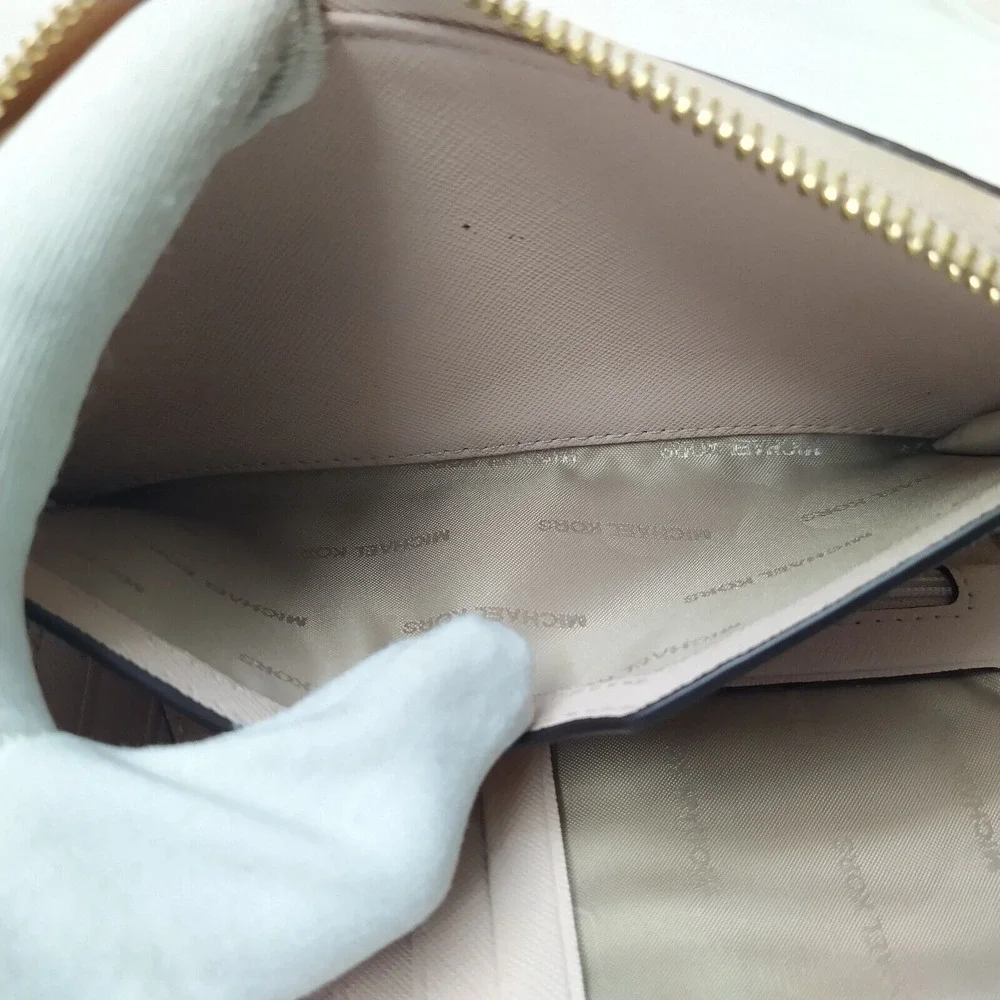 Michael Kors Light Pink Pebbled Leather Zip Around Credit Card ID Window Wallet